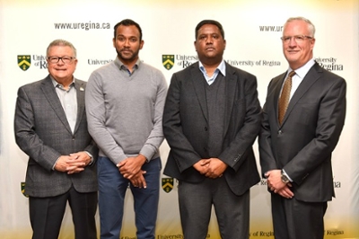 L-R: The Honourable Ralph Goodale, Minister of Public Safety and Emergency Preparedness, Dr. Tarun Katapally, assistant professor at the University’s Johnson Shoyama Graduate School of Public Policy, Dr. Mohan Babu, associate professor in the Department of Chemistry and Biochemistry, and Dr. Thomas Chase, Provost and Vice-President (Academic), at today’s CIHR funding announcement at the University of Regina. Photo Credit: U of R Photography